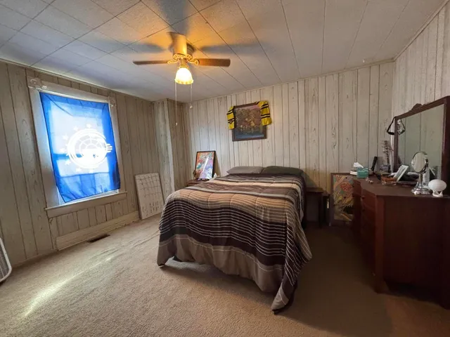 a room with furniture and a flat screen tv
