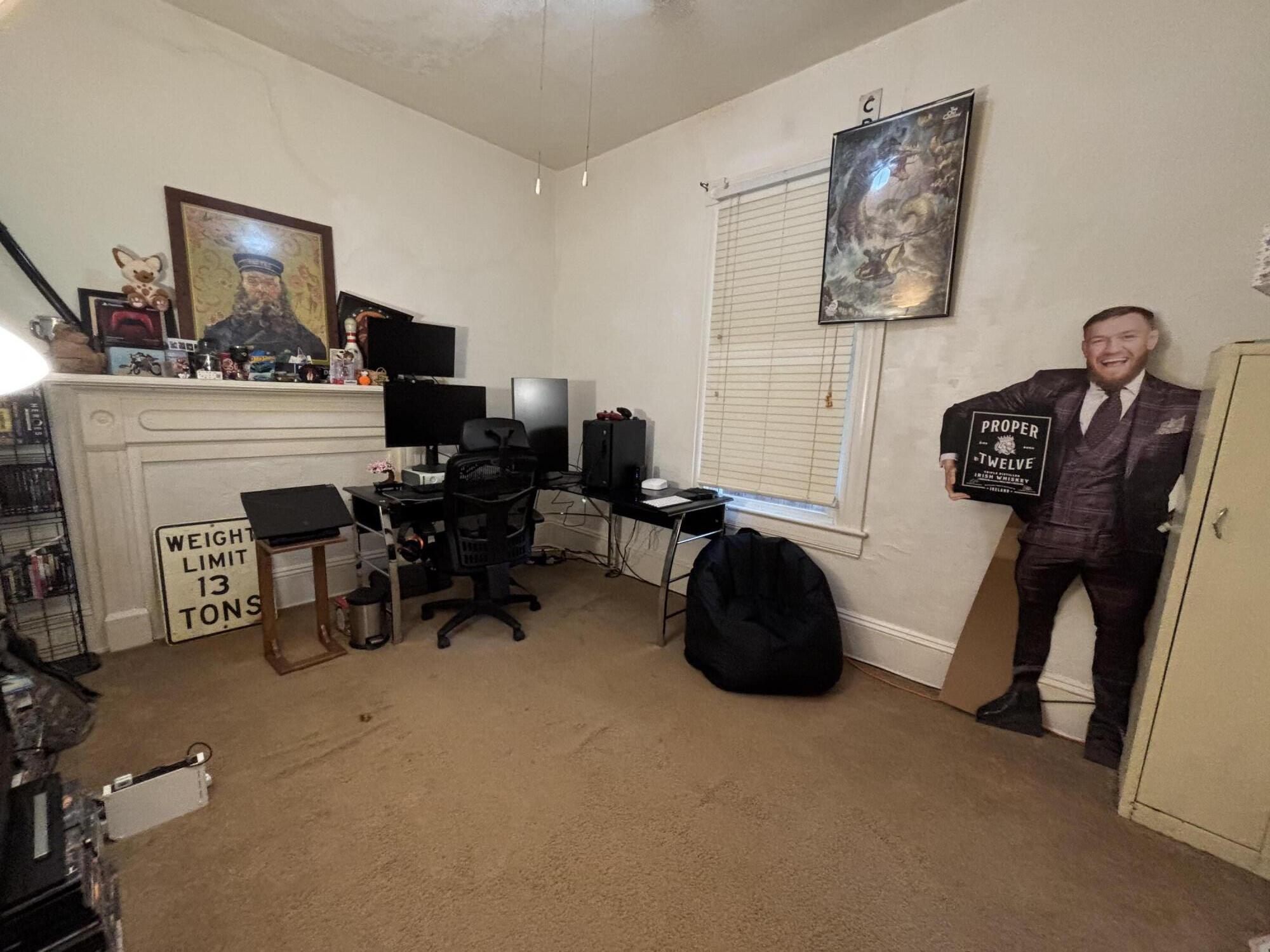 165 West College Street Rocky Mount, VA 24151 - Photo 19 of 24 a room with furniture and a flat screen tv