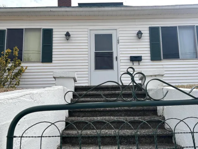 a table with a sink and a window