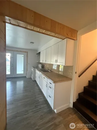 a view of balcony with furniture