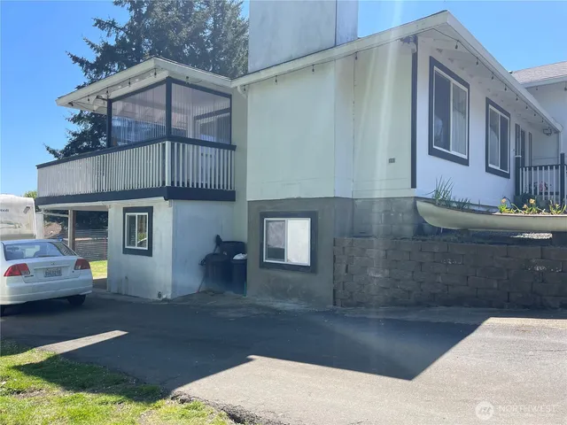 a front view of a house with yard