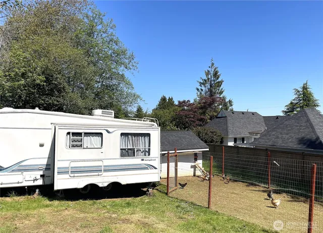 a house view with a backyard space