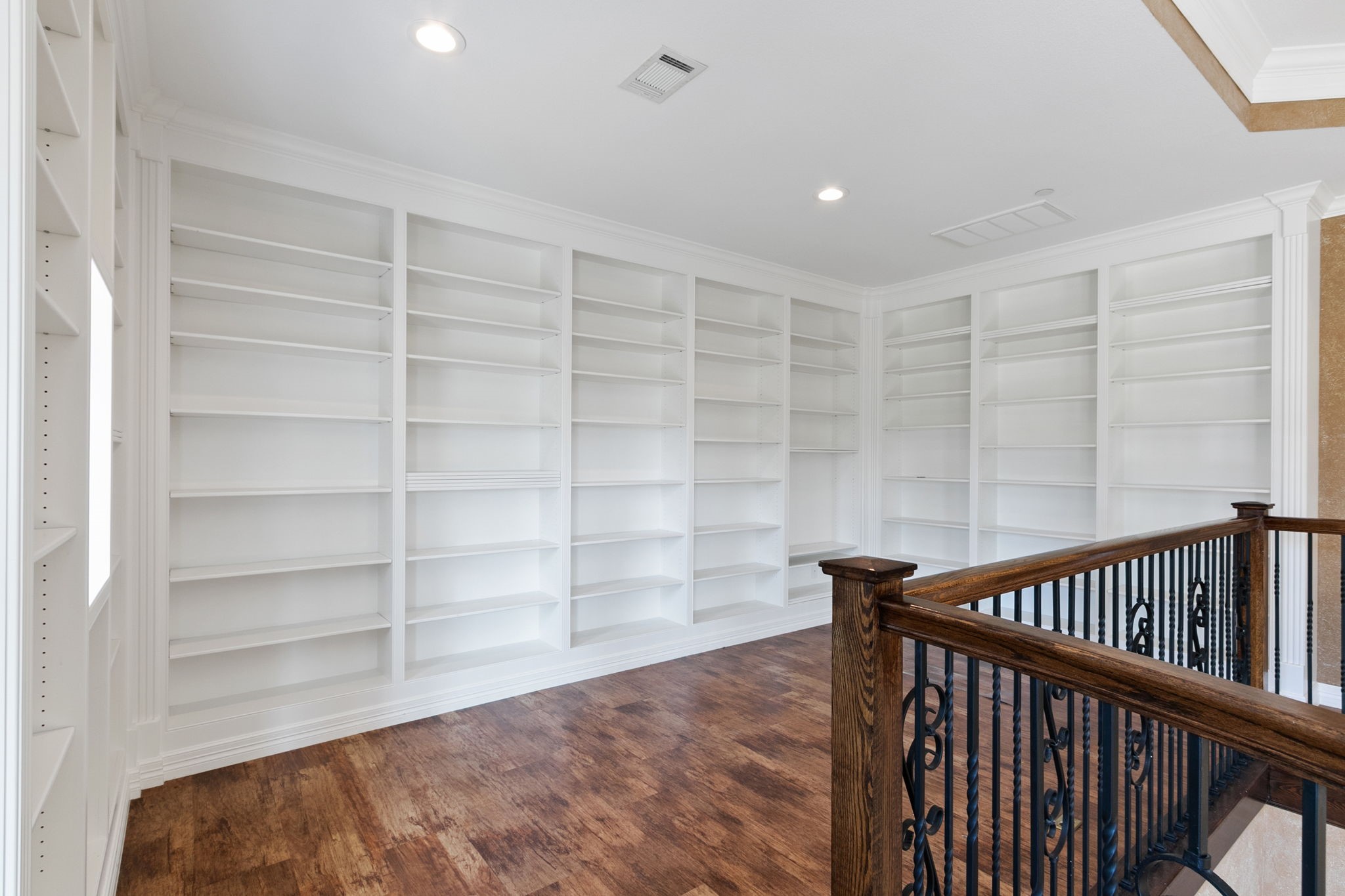 17018 Grant Road Cypress, TX 77429 - Photo 30 of 50 a view of a hallway with wooden floor and closet