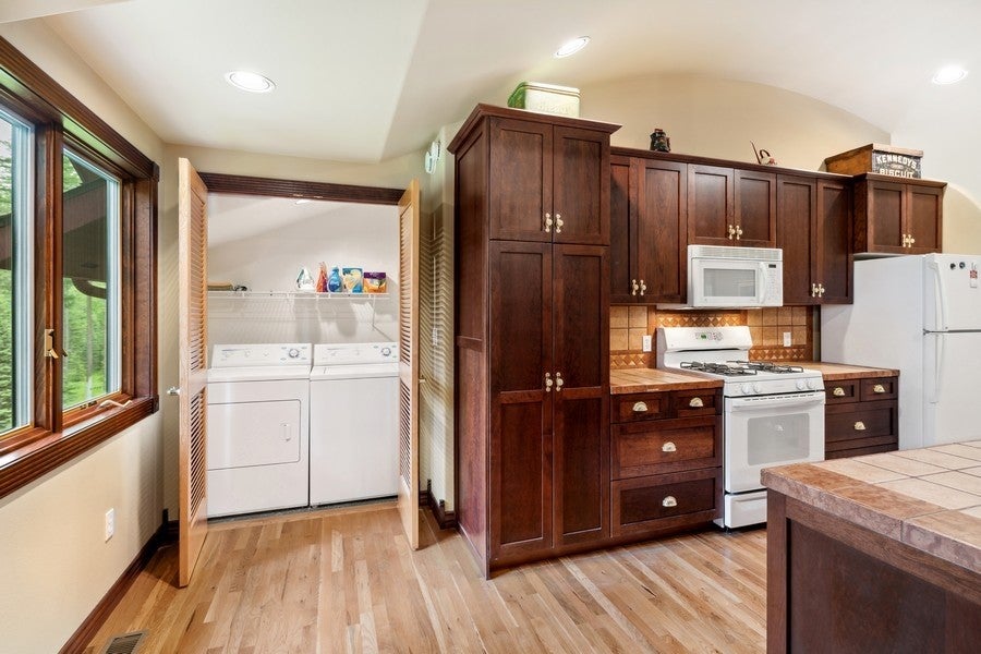 940 McCaffery Road Bigfork, MT 59911 - Photo 29 of 70 Guest Apartment Kitchen & Laundry