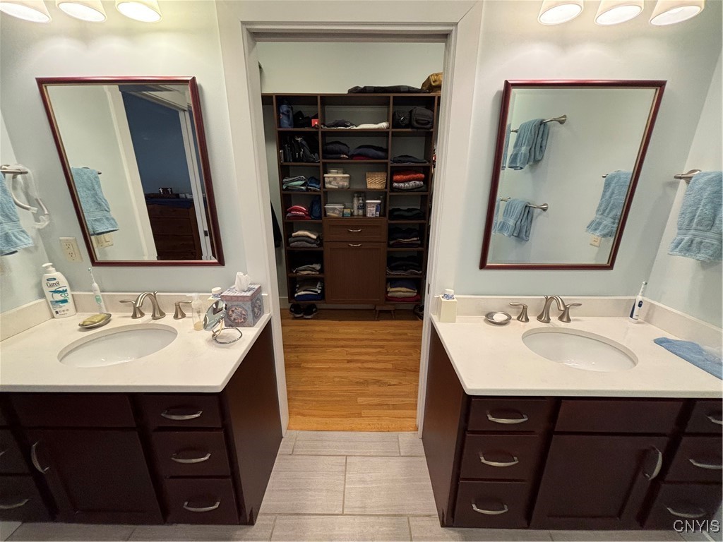 139 Burtis Point Road Owasco, NY 13021 - Photo 34 of 50 Access the large walk-in closet, with custom shelv