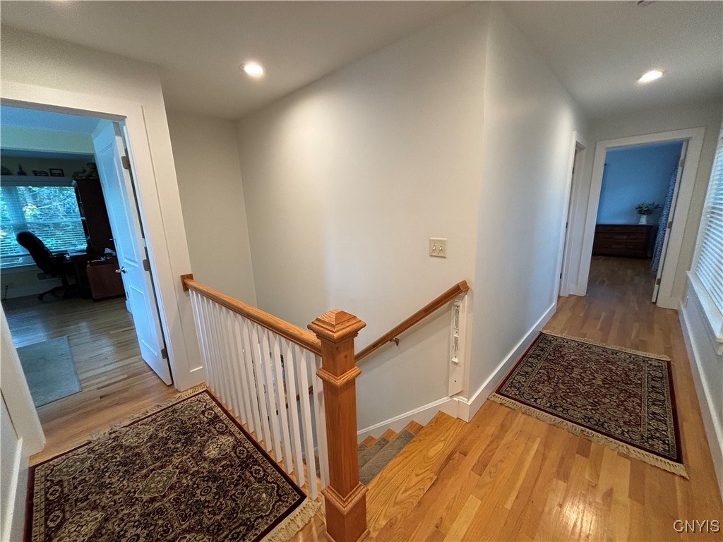 139 Burtis Point Road Owasco, NY 13021 - Photo 36 of 50 Second floor hallway leading to the three upstairs