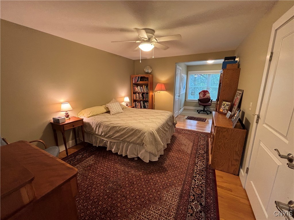 139 Burtis Point Road Owasco, NY 13021 - Photo 39 of 50 Spacious bedroom with office area and access to ad