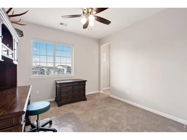 a room with furniture and window