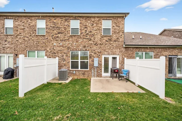 front view of a house with yard