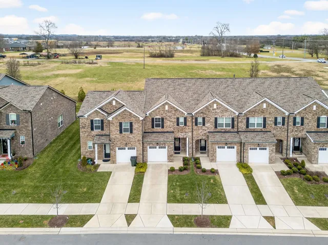 a view of a city with an ocean view