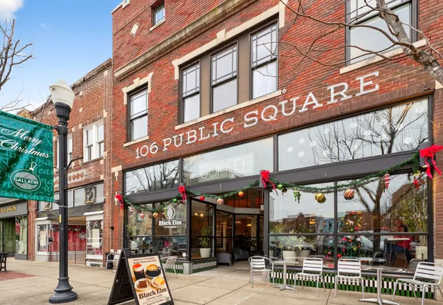 a view of street with shops