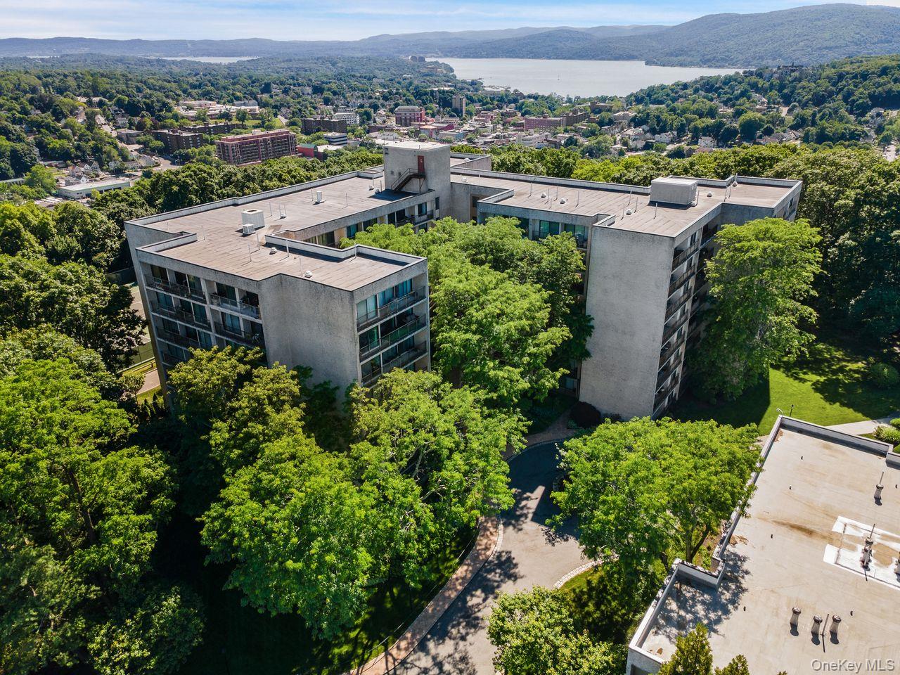 150 Overlook, Unit 5F Peekskill, NY 10566 - Photo 2 of 48 Nestled upon 14 meticulously manicured acres wherein nature, quiet elegance and an unparalled beauty surround you!