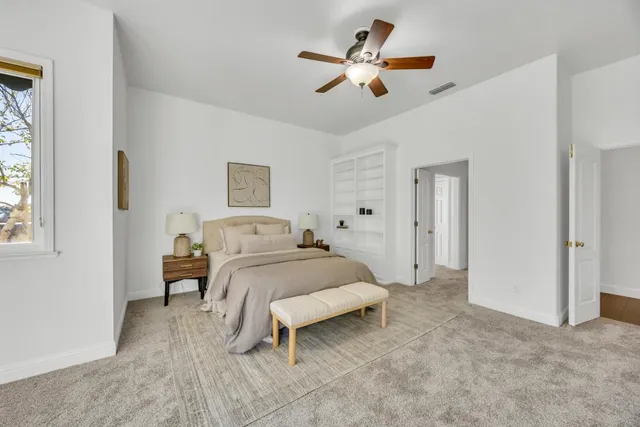 a view of a kitchen with furniture and a window