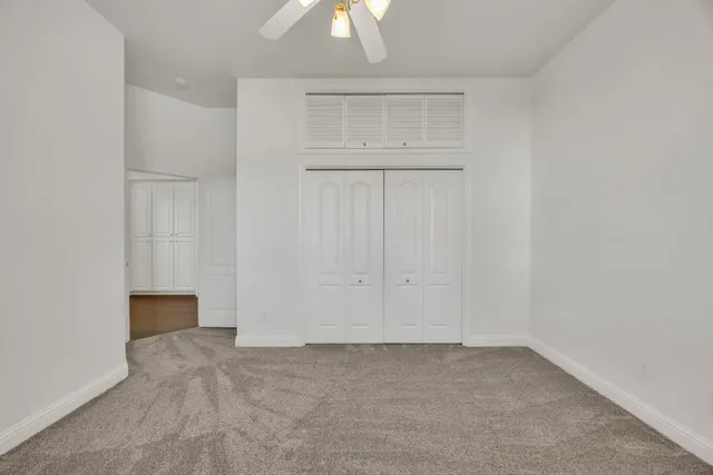 an aerial view of a house with a garden