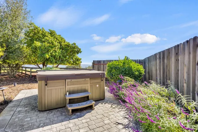 a view of a house with a small yard