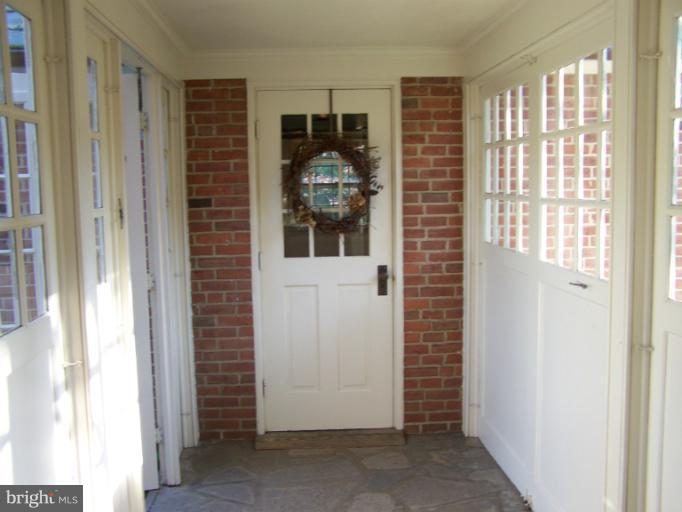 107 Bellemore Road Baltimore, MD 21210 - Photo 13 of 16 a view of a door and a window