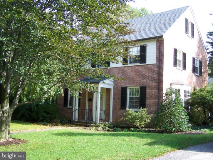 107 Bellemore Road Baltimore, MD 21210 - Photo 16 of 16 a front view of a house with a yard and tree