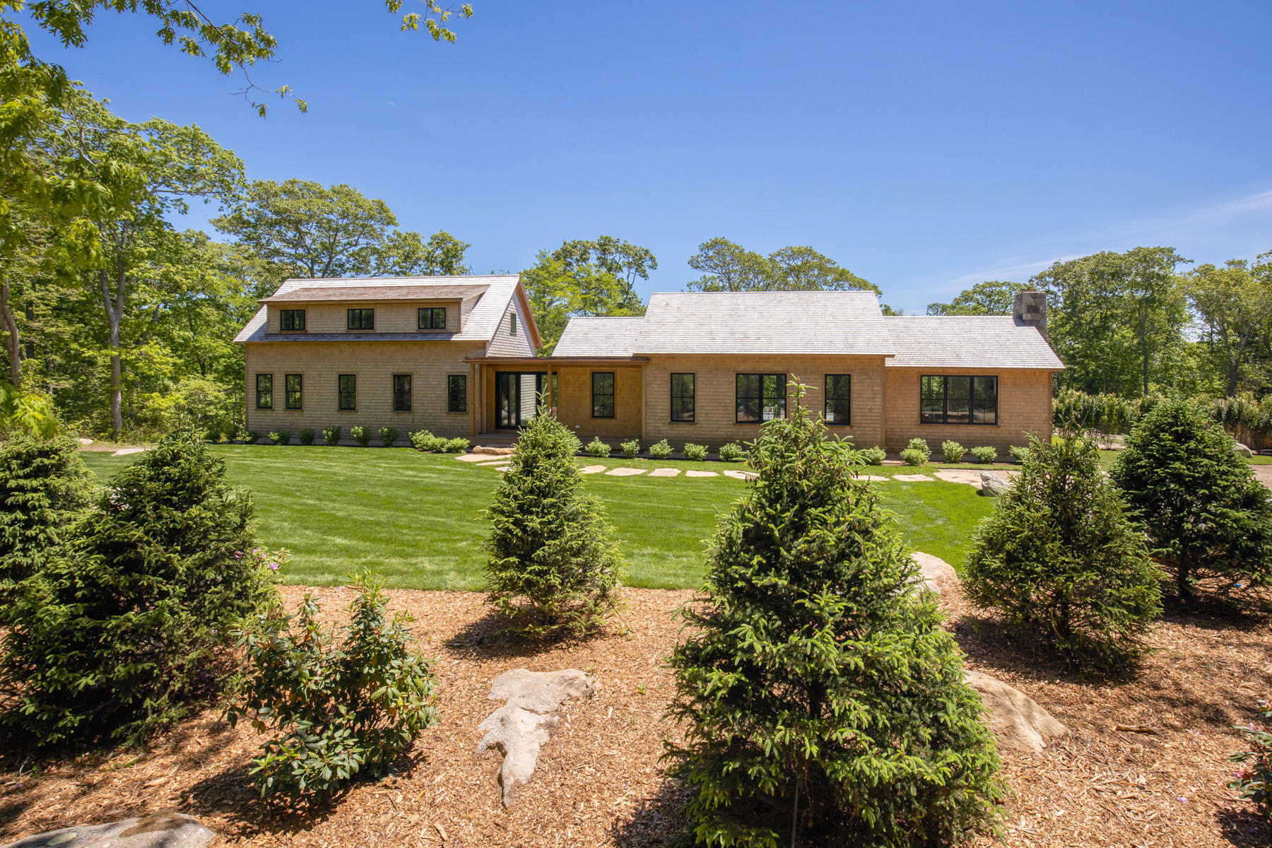 25 Luce Farm Road West Tisbury, MA 02568 - Photo 1 of 26 a front view of a house with garden