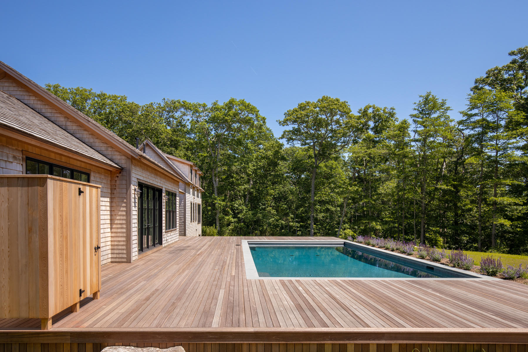 25 Luce Farm Road West Tisbury, MA 02568 - Photo 23 of 26 a view of a balcony with wooden floor and plants