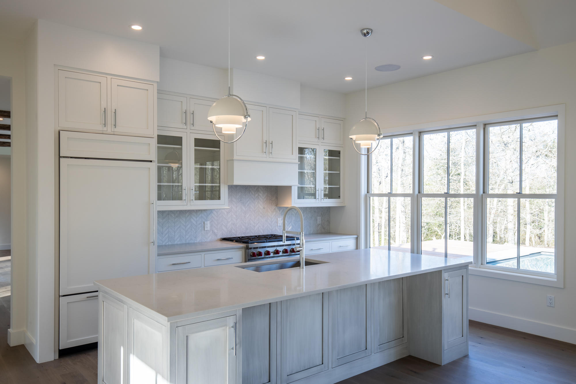 25 Luce Farm Road West Tisbury, MA 02568 - Photo 6 of 26 a kitchen with a refrigerator and windows