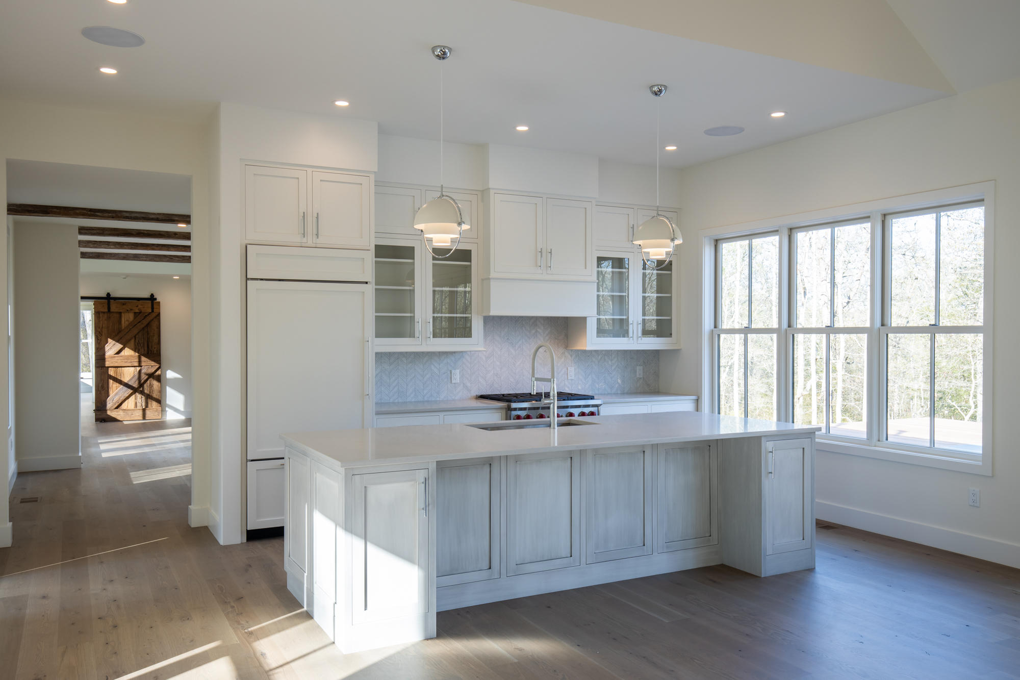25 Luce Farm Road West Tisbury, MA 02568 - Photo 8 of 26 a kitchen with stainless steel appliances granite countertop a stove a sink and a refrigerator