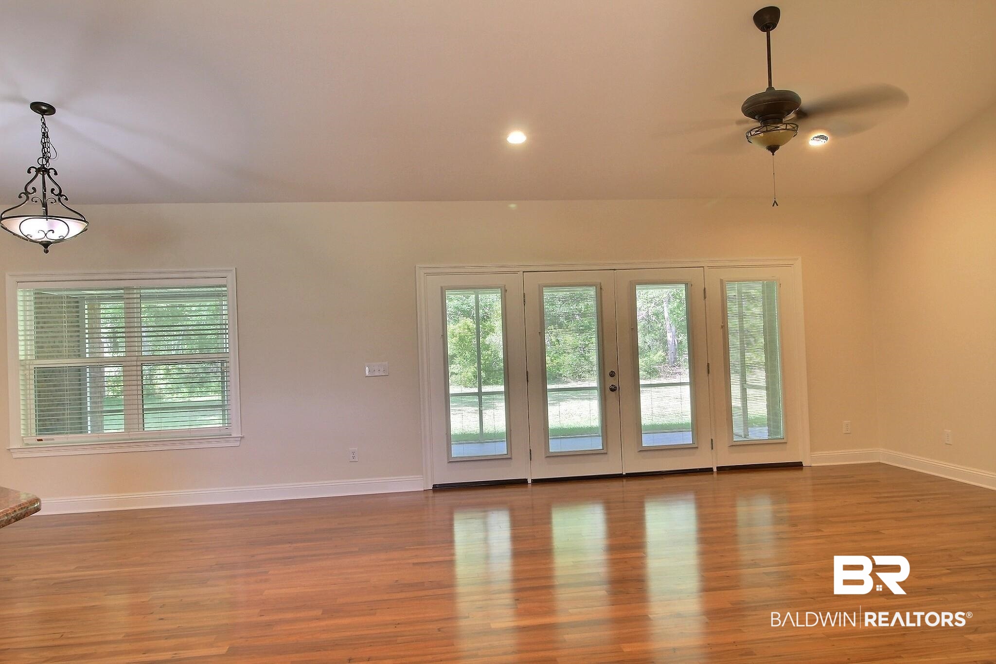 32891 Arbor Ridge Circle Lillian, AL 36549 - Photo 6 of 37 Triple French doors leading to screened porch
