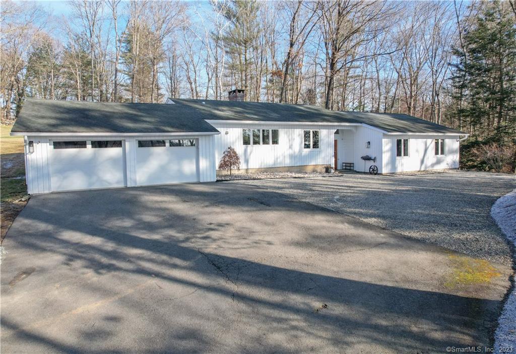 a front view of house with yard