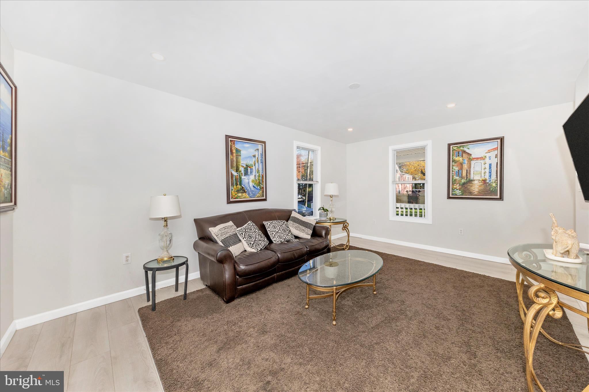 6216 Manor Woods Road Frederick, MD 21703 - Photo 13 of 45 a living room with furniture and a window