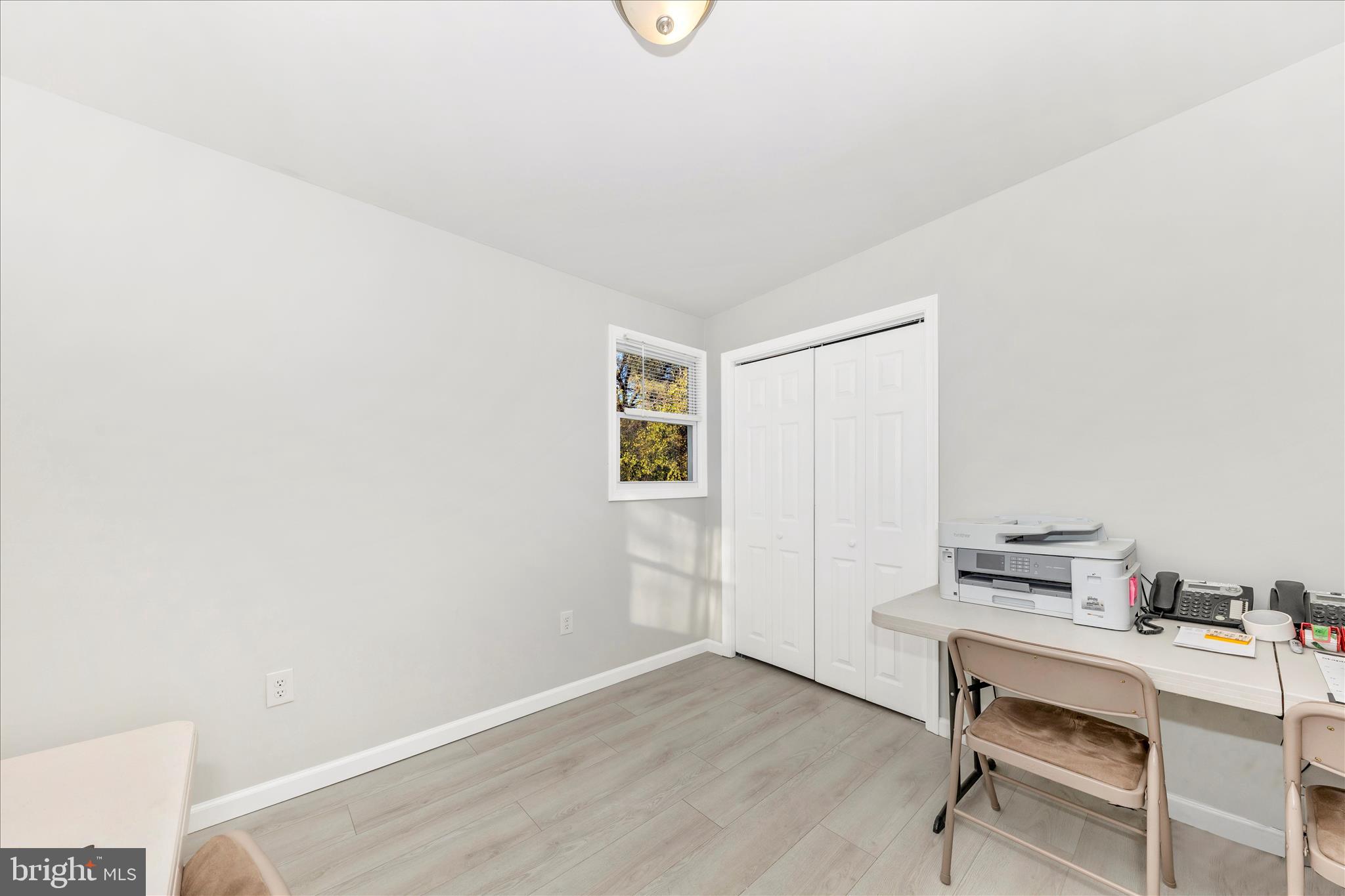 6216 Manor Woods Road Frederick, MD 21703 - Photo 22 of 45 a workspace with furniture and window