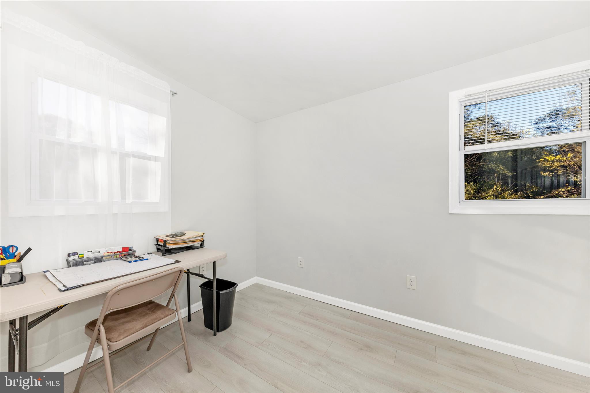 6216 Manor Woods Road Frederick, MD 21703 - Photo 23 of 45 a room with a window and furniture