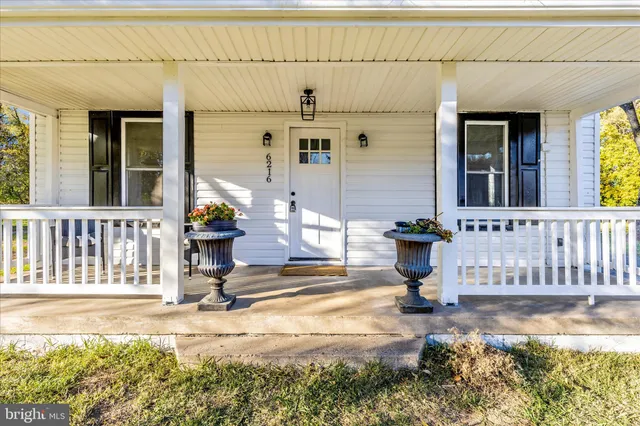 front view of a house with a patio
