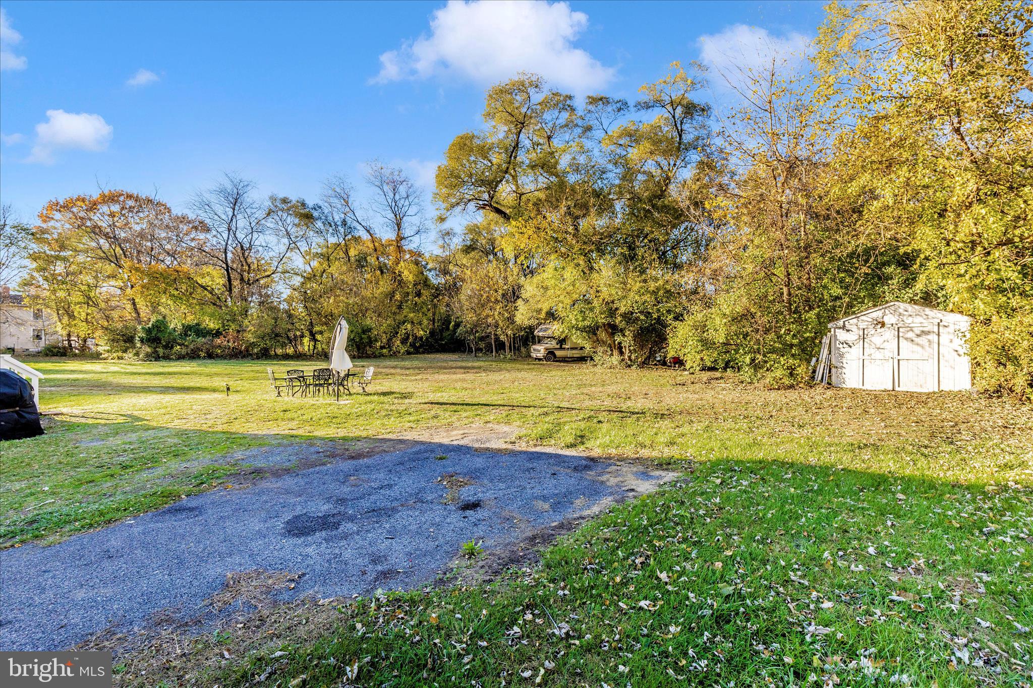 6216 Manor Woods Road Frederick, MD 21703 - Photo 45 of 45 a view of a swimming pool with an outdoor space and seating area