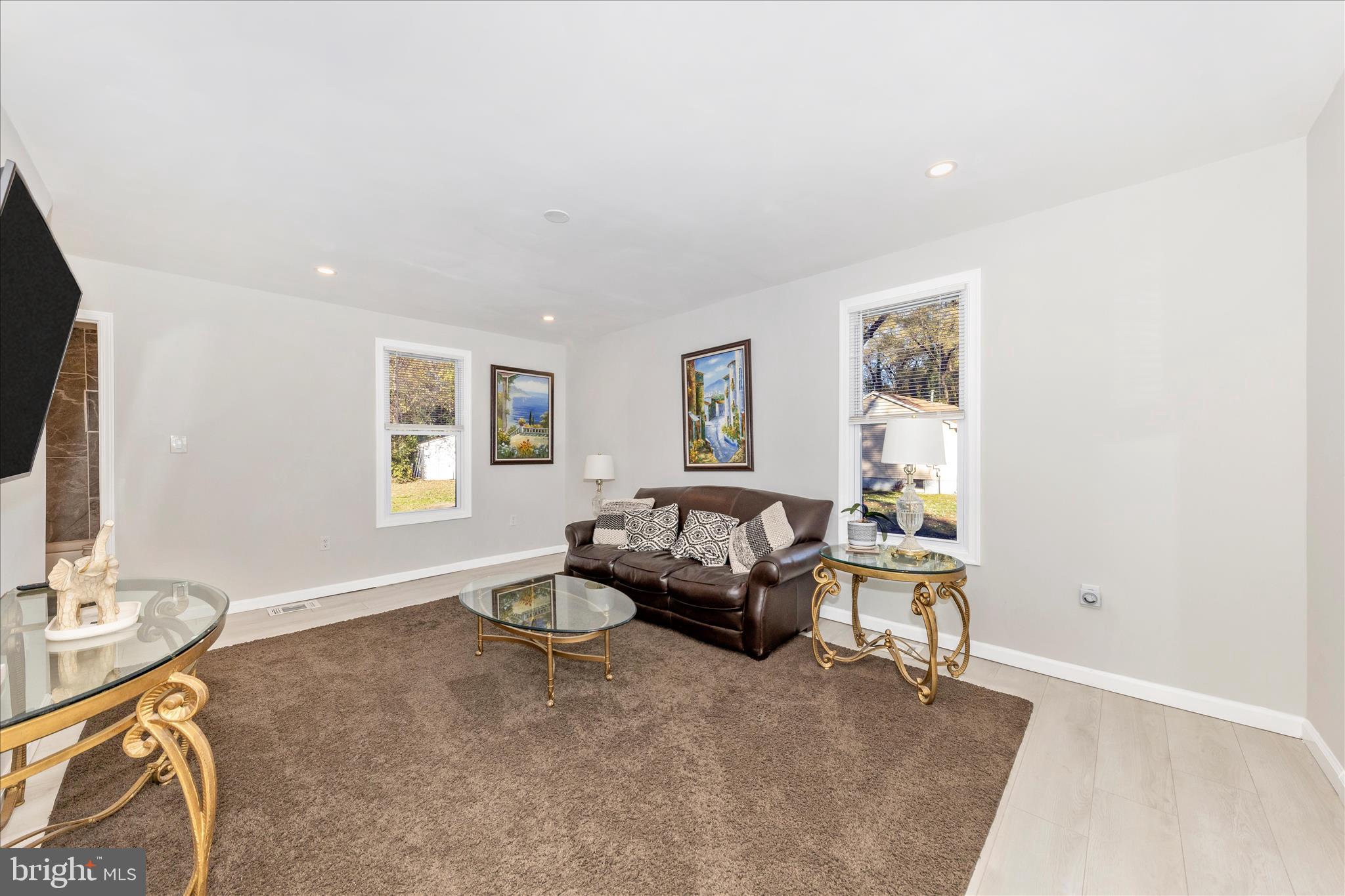 6216 Manor Woods Road Frederick, MD 21703 - Photo 10 of 45 a living room with furniture and a window