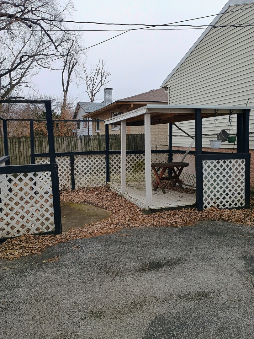 16601 Honore Avenue Markham, IL 60428 - Photo 10 of 11 a front view of a house with a garage