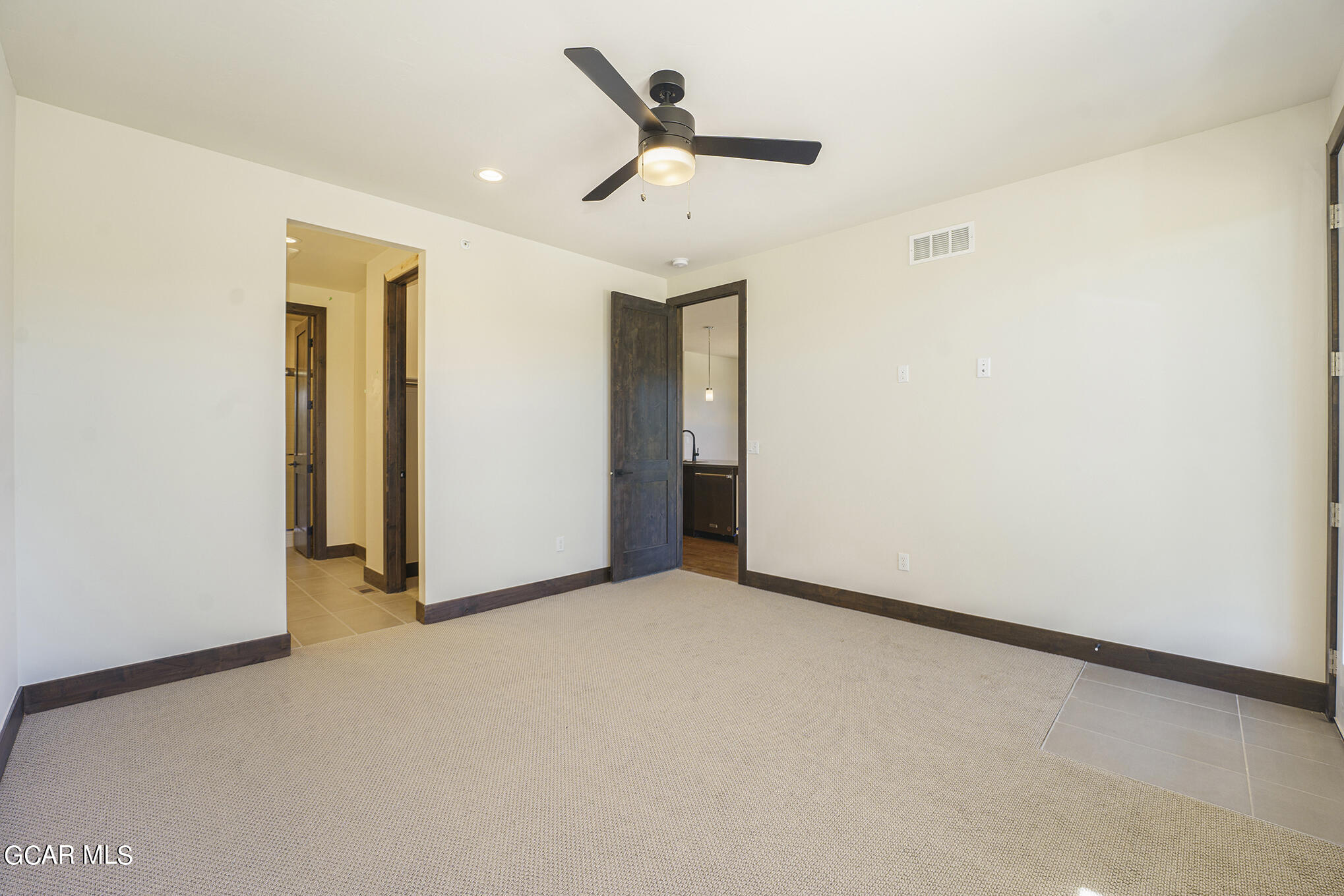 119 Homestead Loop Fraser, CO 80442 - Photo 11 of 22 a view of a livingroom with a ceiling fan and window