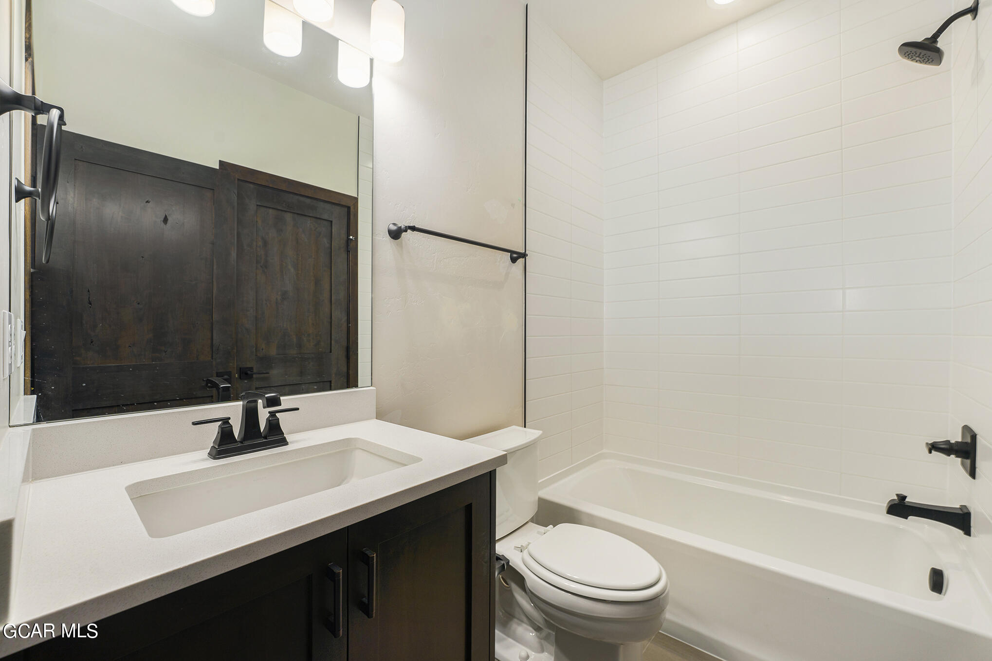 119 Homestead Loop Fraser, CO 80442 - Photo 19 of 22 a bathroom with a sink a toilet and shower
