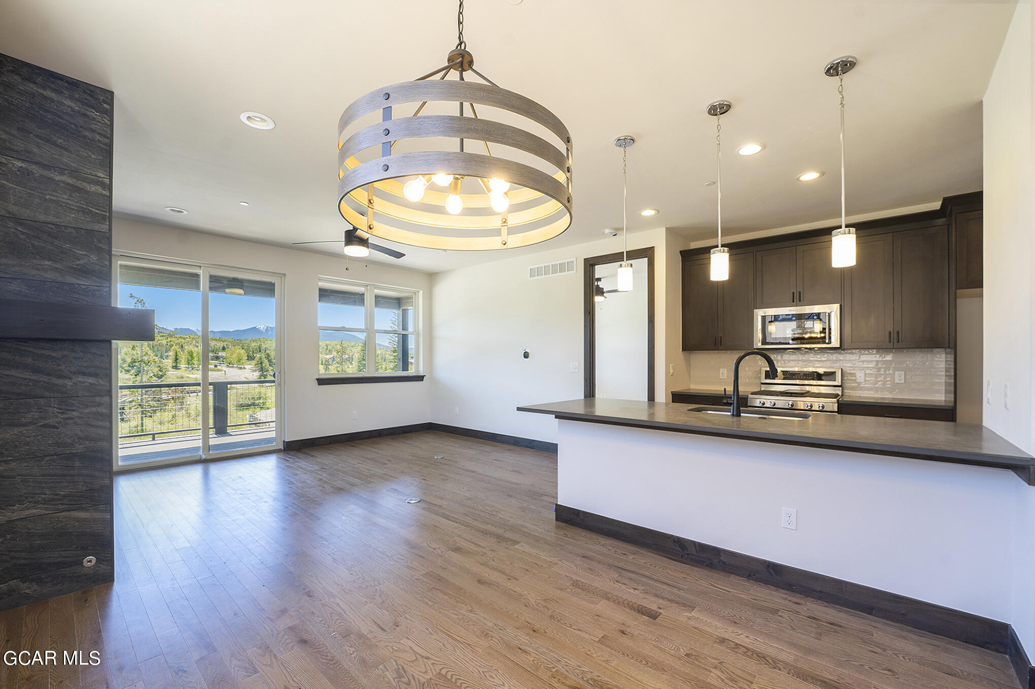 119 Homestead Loop Fraser, CO 80442 - Photo 7 of 22 a view of a room with wooden floor and staircase