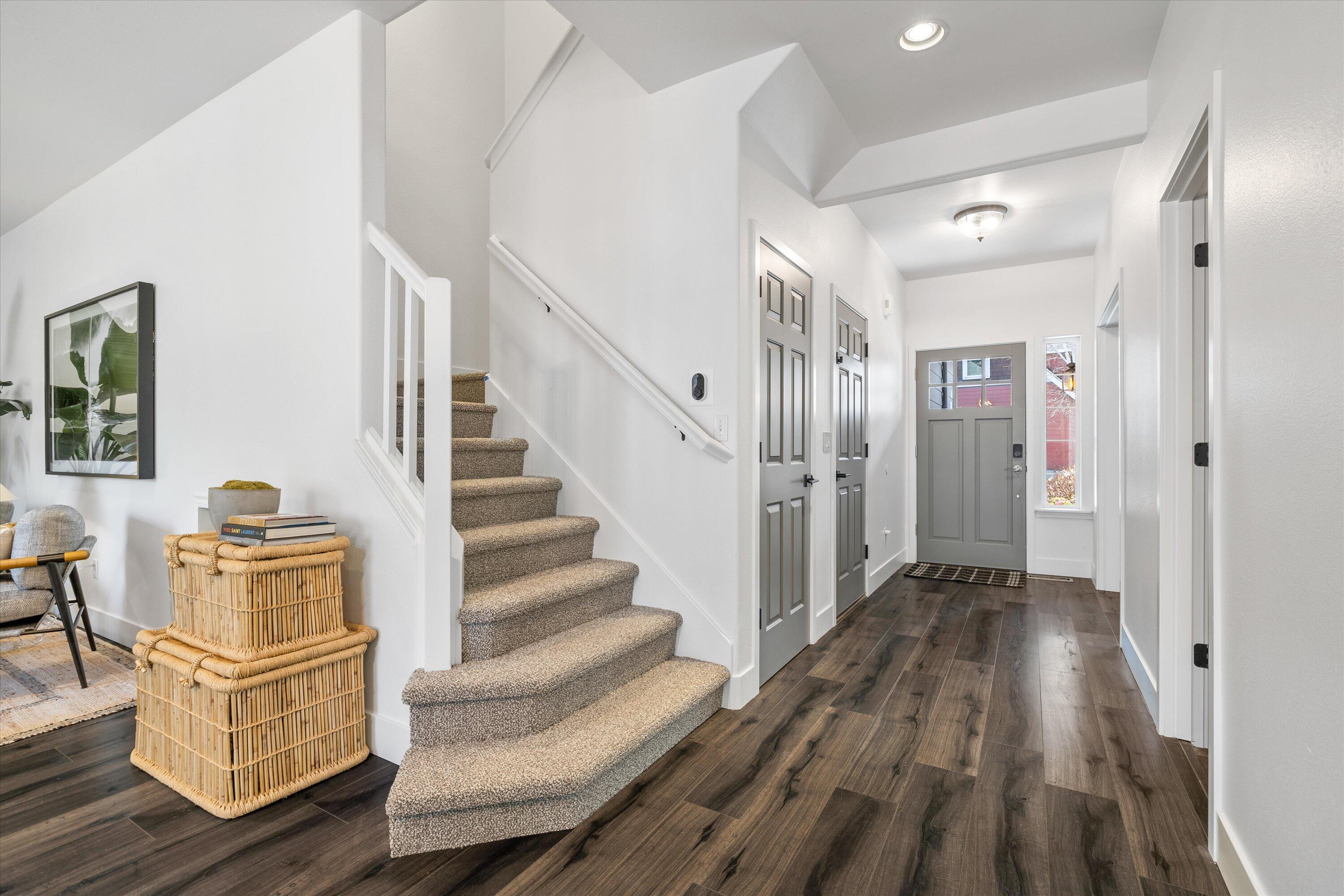 61269 Southwest Brookside Loop Bend, OR 97702 - Photo 24 of 46 Gorgeous flooring and new carpet leading to upstairs bedrooms