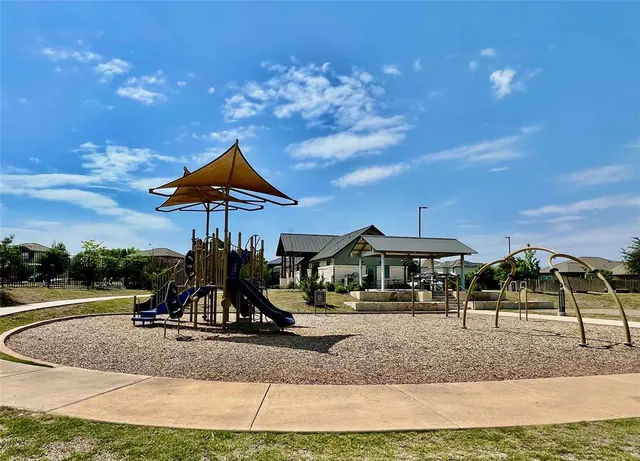 a view of a park with slide