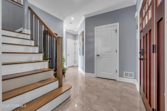 a view of entryway with stairs