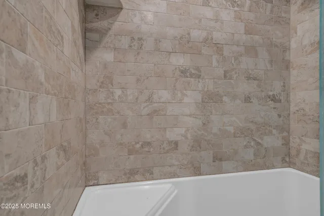 a bathroom with a bathtub