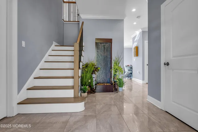 a view of entryway with wooden floor