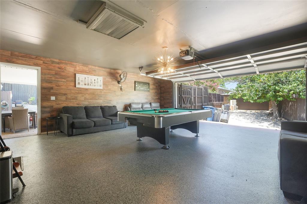 9677 Fallbrook Drive Dallas, TX 75243 - Photo 38 of 40 a living room with furniture and a large window