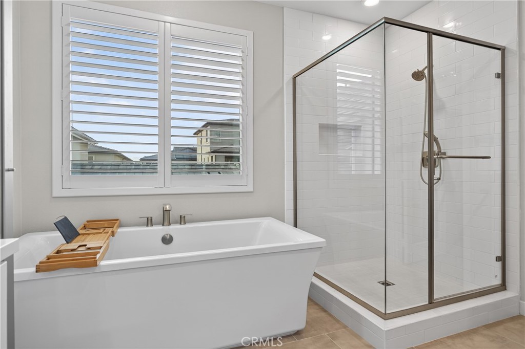 382 Chorus Irvine, CA 92618 - Photo 17 of 38 a bathroom with a tub and a sink