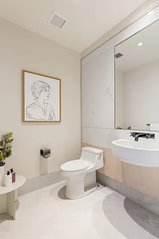 a view of a kitchen with a large window and a table