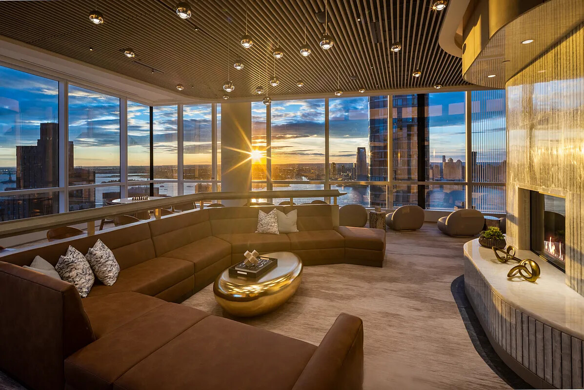 77 Greenwich Street, Unit 23C Manhattan, NY 10006 - Photo 13 of 18 a living room with furniture and a floor to ceiling window