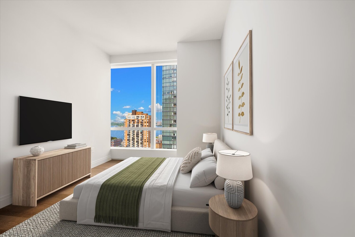 77 Greenwich Street, Unit 23C Manhattan, NY 10006 - Photo 2 of 18 a bedroom with a bed and a flat screen tv