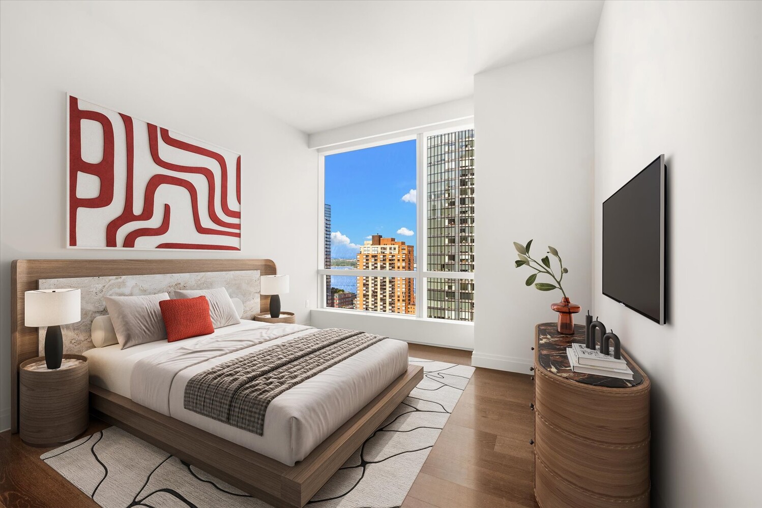 77 Greenwich Street, Unit 23C Manhattan, NY 10006 - Photo 3 of 18 a bedroom with a bed and a flat screen tv