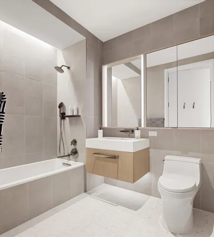 a kitchen with a stove and a refrigerator