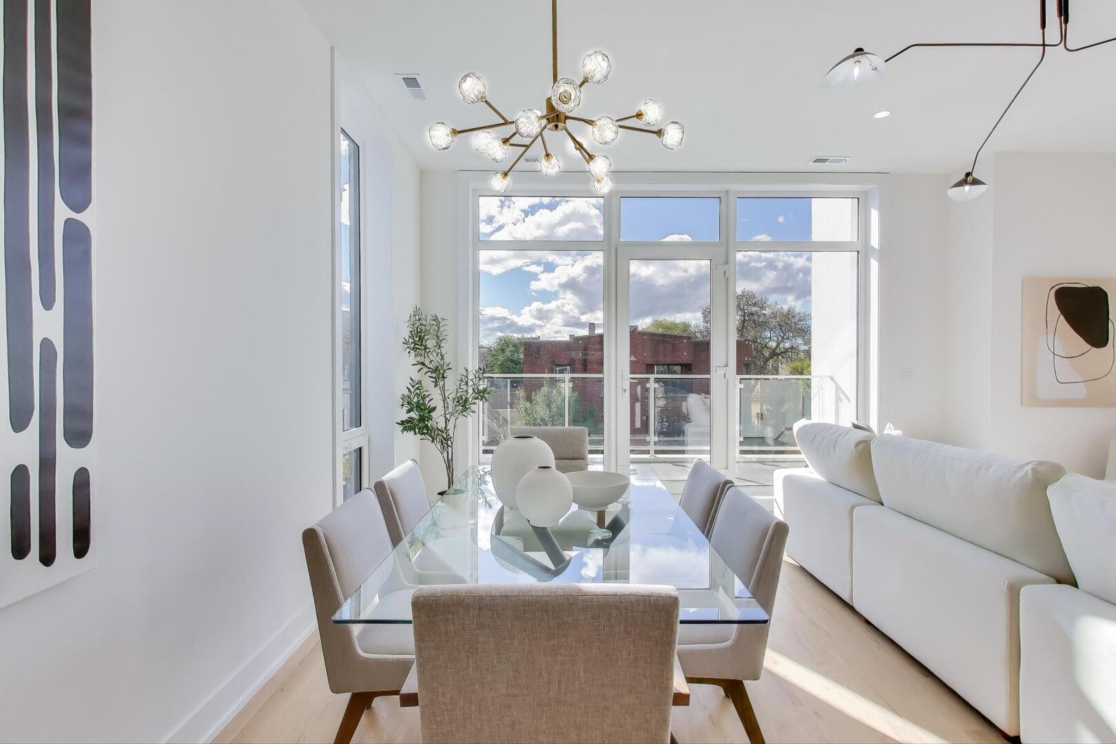 2456 West Cortez Street, Unit 3E Chicago, IL 60622 - Photo 12 of 46 a dining room with furniture a chandelier and window